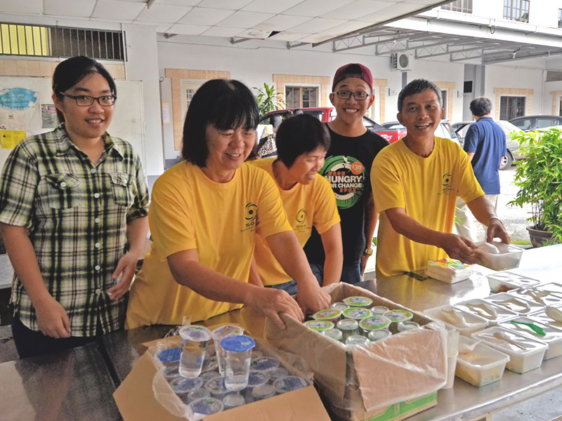 SOA members serving breakfast